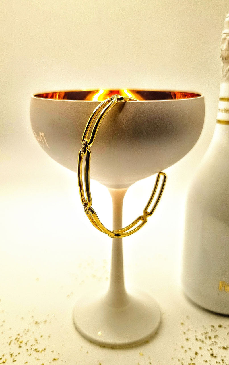 Armreif aus vergoldetem Sterlingsilber mit ovalen Elementen & klaren Zirkonia – 925er Silber - handgefertigt