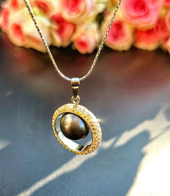 Necklace with pearl pendant & rotating Swarovski® crystal circle, gold - handmade