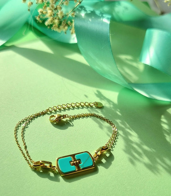 Armkettchen goldfarben, Edelstahl mit Perlmutt-Anhänger türkis– Doppelreihig