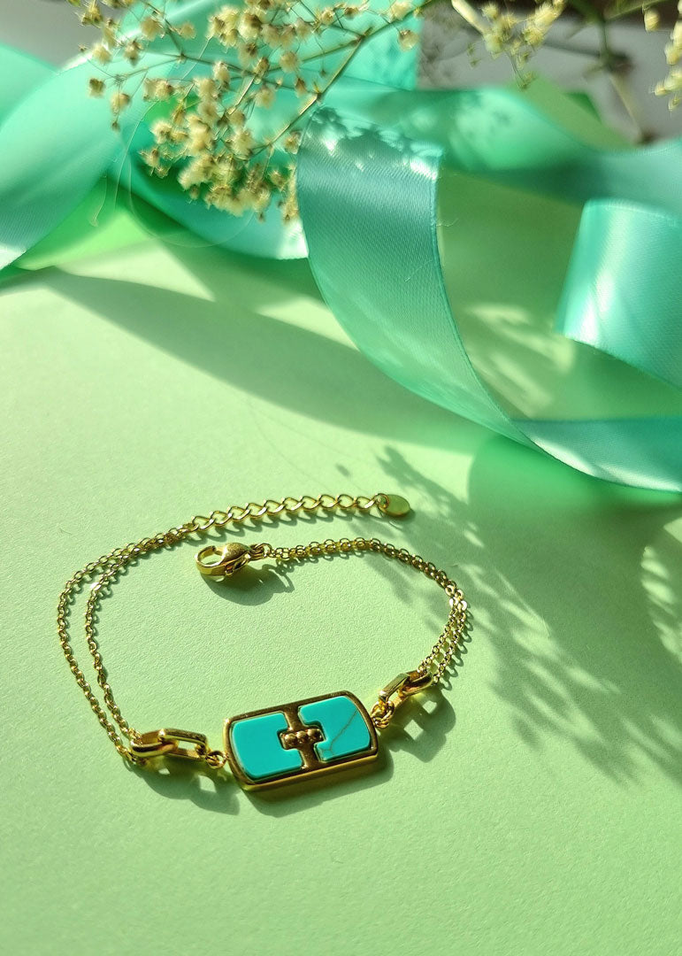 Armkettchen goldfarben, Edelstahl mit Perlmutt-Anhänger türkis– Doppelreihig