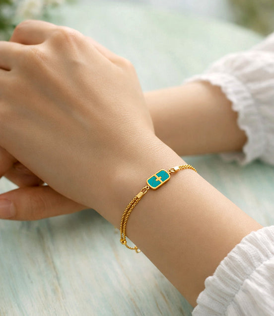 Armkettchen goldfarben, Edelstahl mit Perlmutt-Anhänger türkis– Doppelreihig