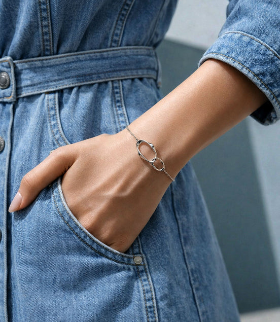 Bracelet silver-colored – with intertwined rings