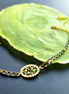 Kordelarmband Grün-Gold mit Glasperlen & ovalem Element