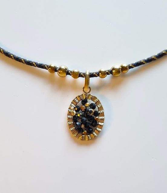 Black-Gold Necklace with Oval Pendant and Black Beads