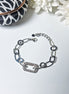 Stainless steel bracelet, silver-colored with rectangular rhinestone element