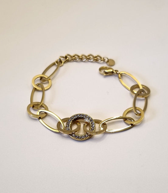 Armband aus goldfarbenen Edelstahlgliedern mit Strass besetztem Mittelring