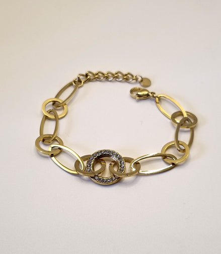 Armband aus goldfarbenen Edelstahlgliedern mit Strass besetztem Mittelring