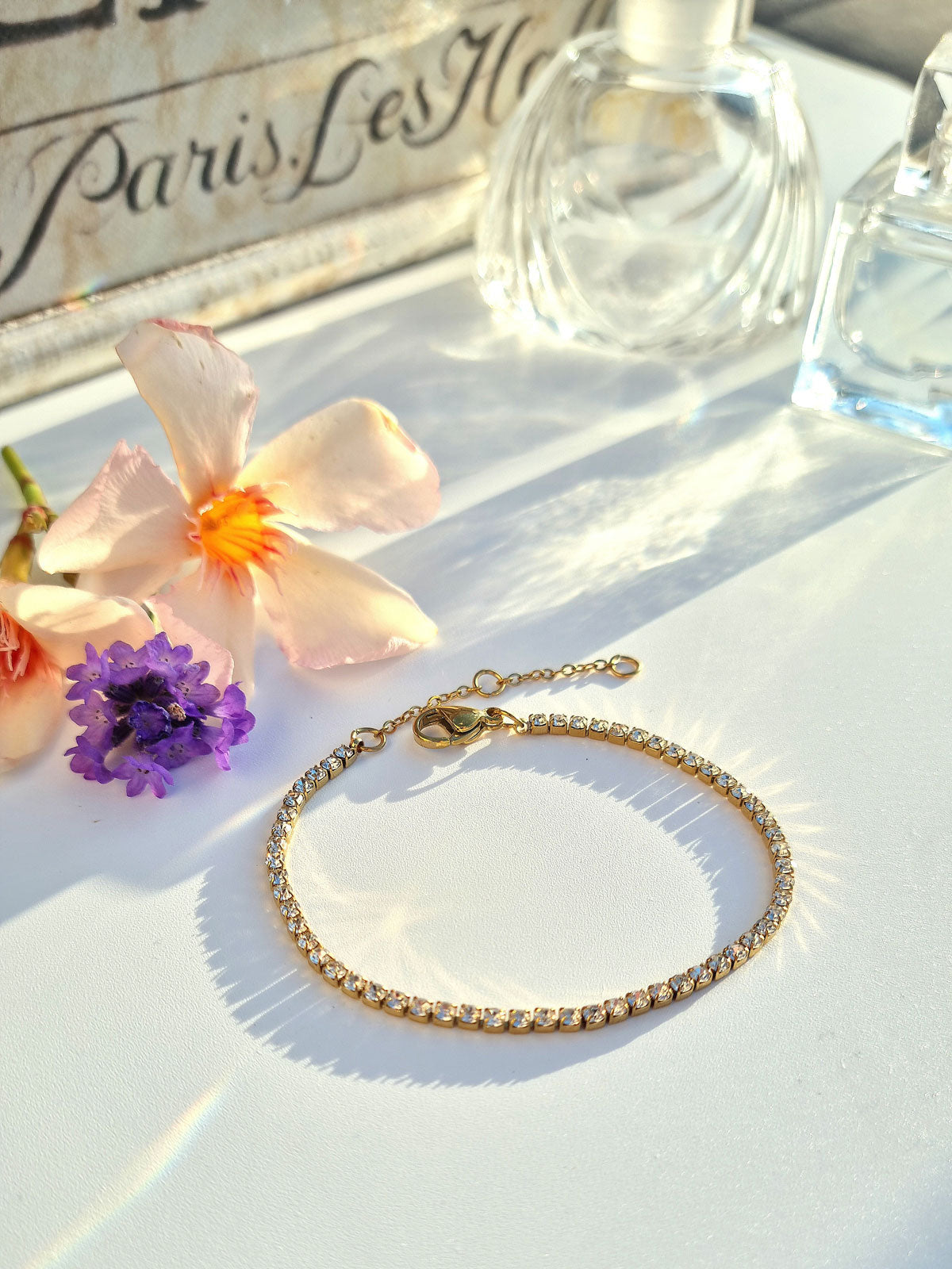 Tennisarmband goldfarben aus Edelstahl mit klaren Zirkonia-Steinen
